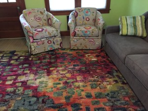 Two swivel rocking chairs