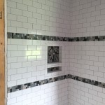 Bathroom shower tile and nitch complete.